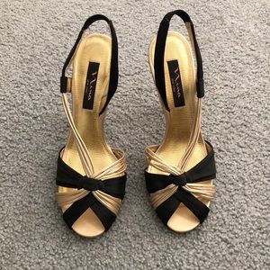 Black and gold heels